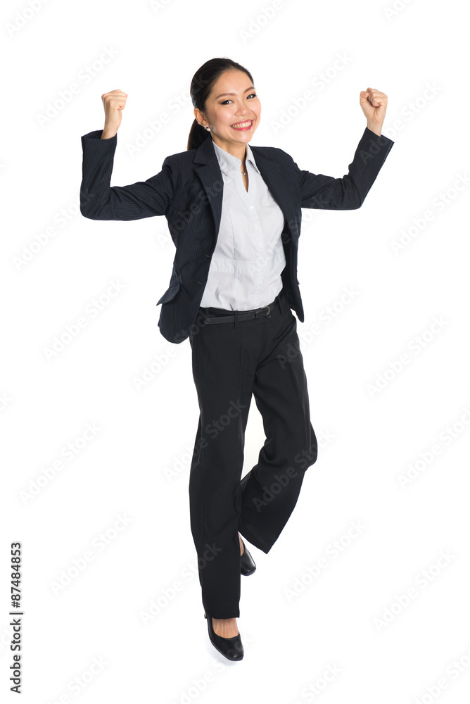 Successful young business woman happy for her success. Isolated Successful young business woman happy for her success. Isolated