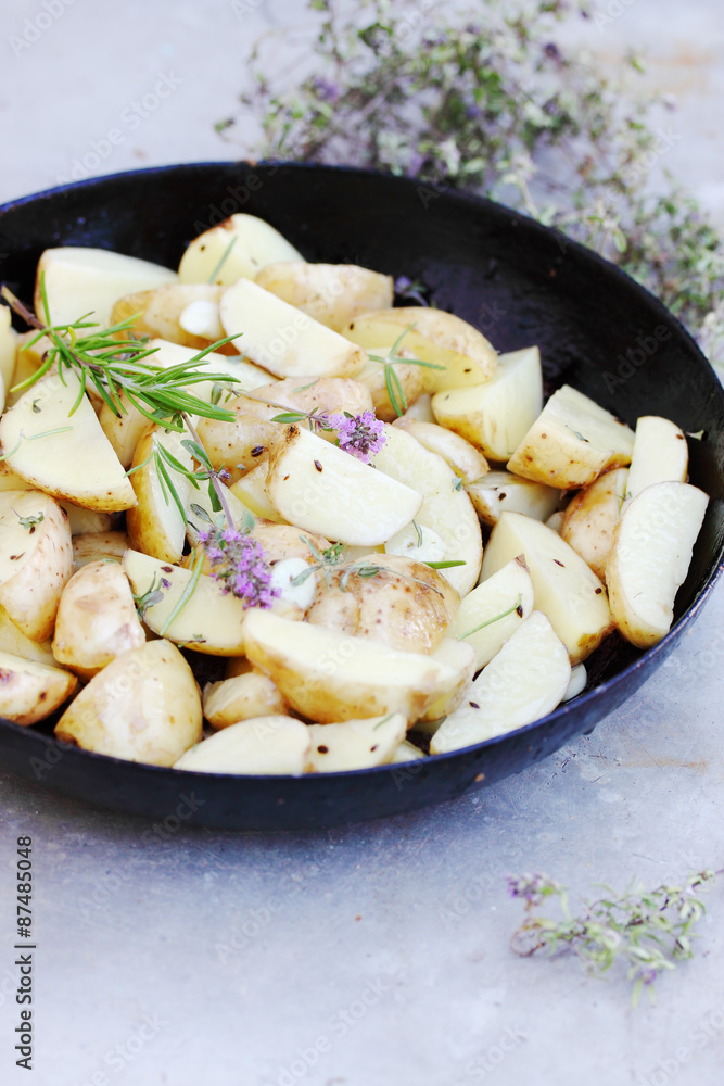potatoes on a baking sheet potatoes on a baking sheet