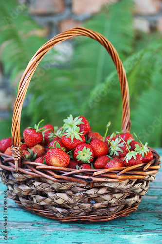 strawberries  in wicker basket