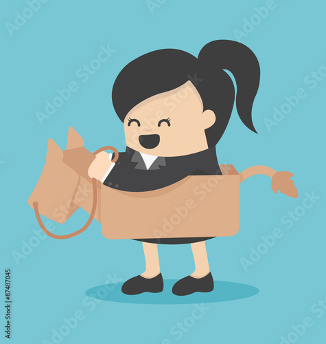 business woman riding the toy horse