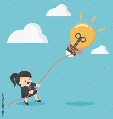 business woman pulling bulb with rope