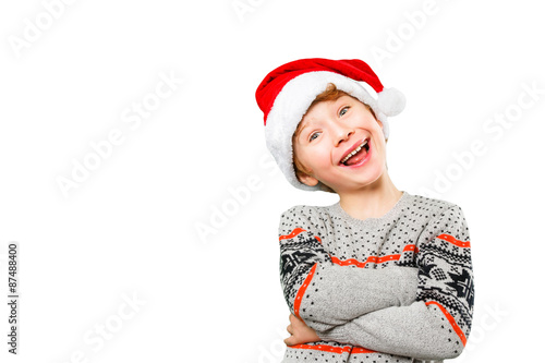 Portrait of a boy in christmas hat with happy and joyful facial