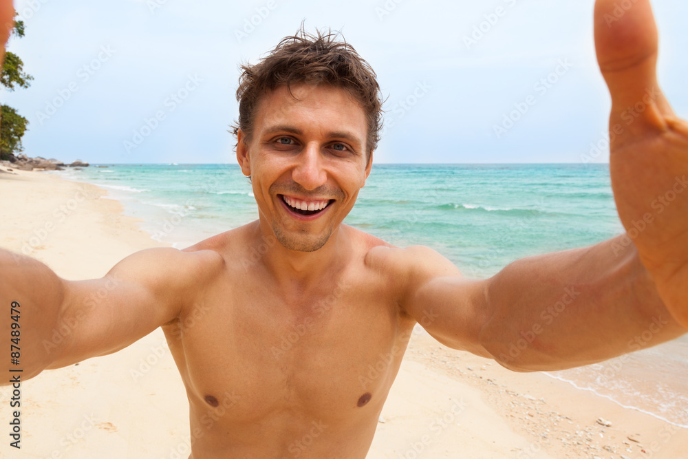 Tourist man beach taking selfie photo picture happy smile Tourist man beach taking selfie photo picture happy smile