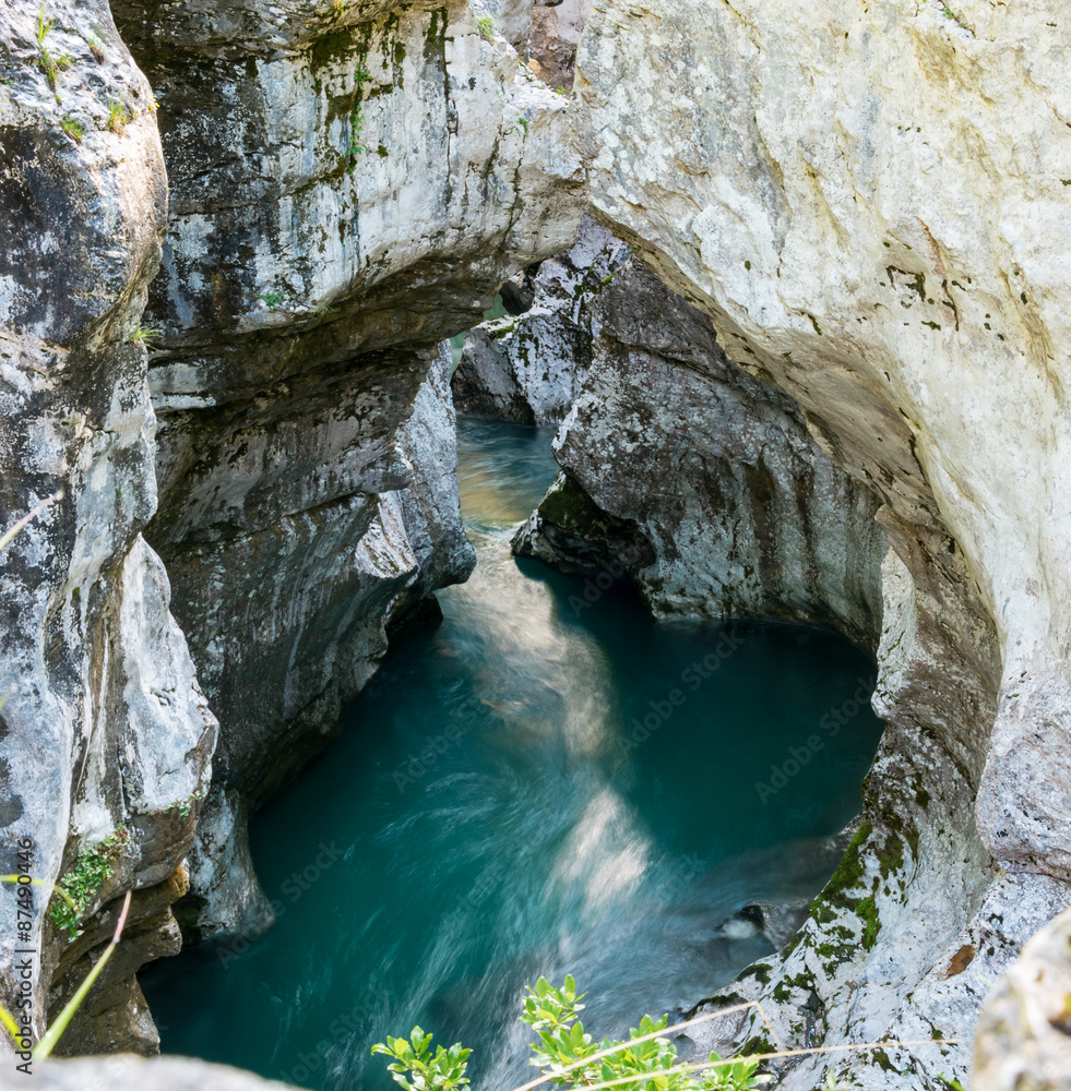 When the river Soca hits the rocks and gets tightened into a narrow part of the stream