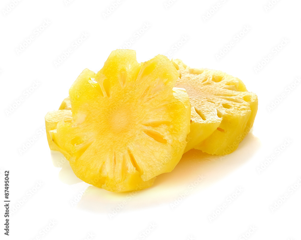 Sliced pineapple over white background Sliced pineapple over white background
