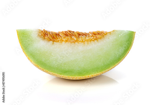 cantaloupe melon slices on white background.