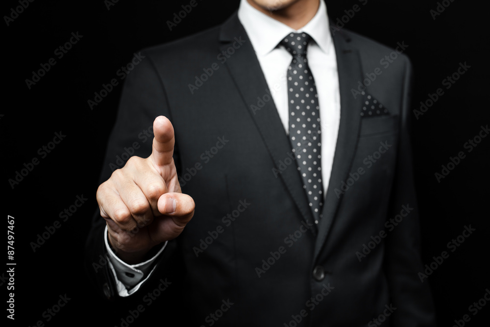 man in suit on a black background man in suit on a black background