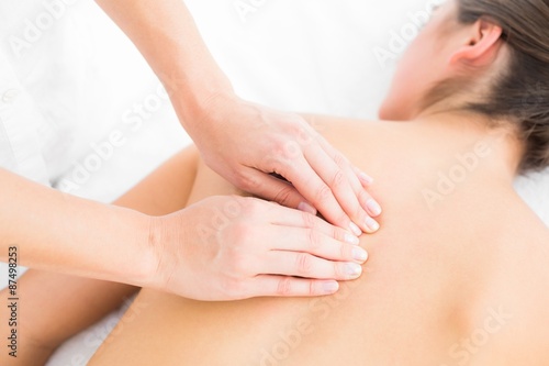 Pretty woman enjoying a back massage