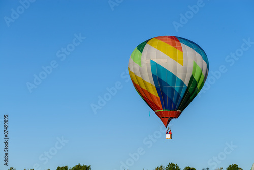 colorful hot air balloon in the blue sky © smspsy