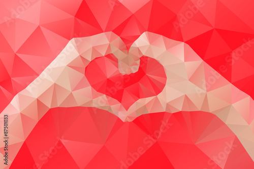 Female hands making a heart shape by abstract geometric triangle in low poly style. Vector illustration