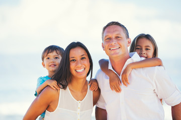 Happy Mixed Race Family Having Fun Outdoors