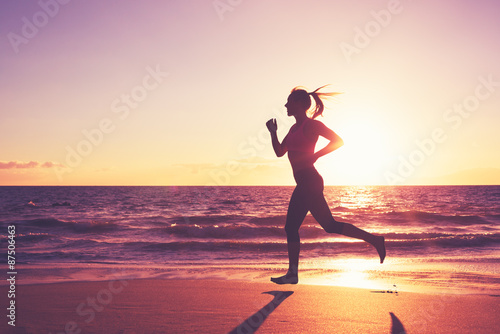 Woman Running at Sunset