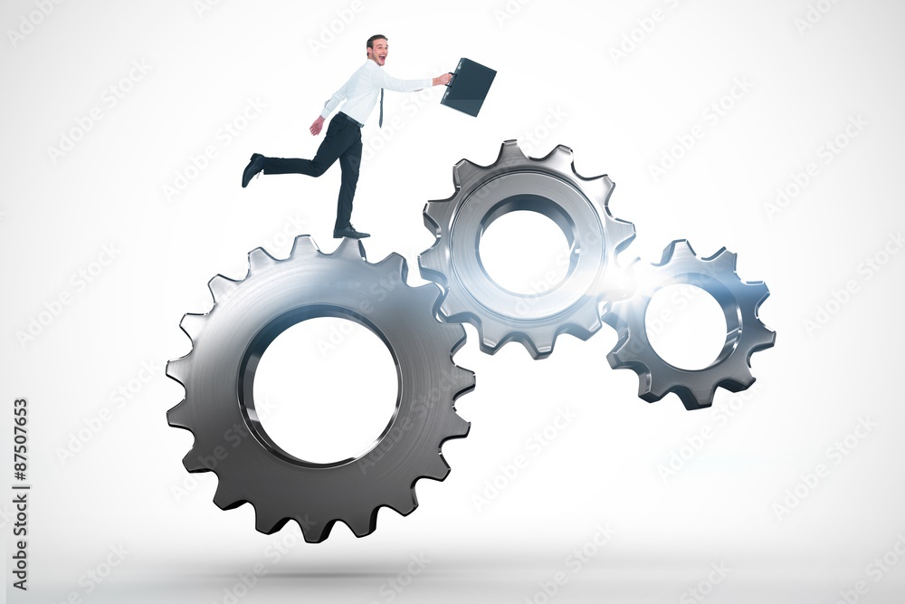 Composite image of happy businessman leaping with his briefcase Composite image of happy businessman leaping with his briefcase