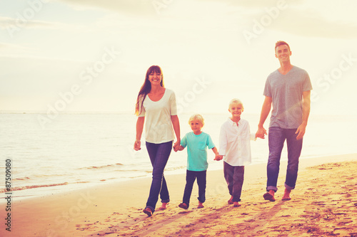 Young Family Having Fun on the Beach