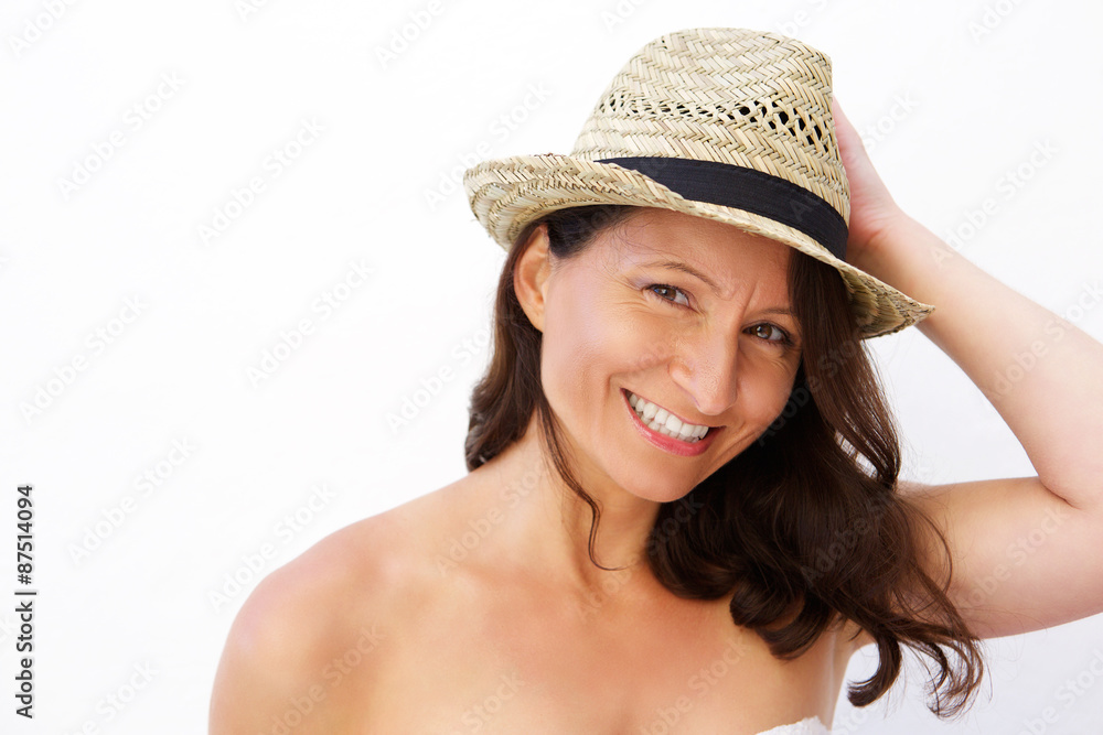Attractive mid age woman smiling with summer style hat Attractive mid age woman smiling with summer style hat