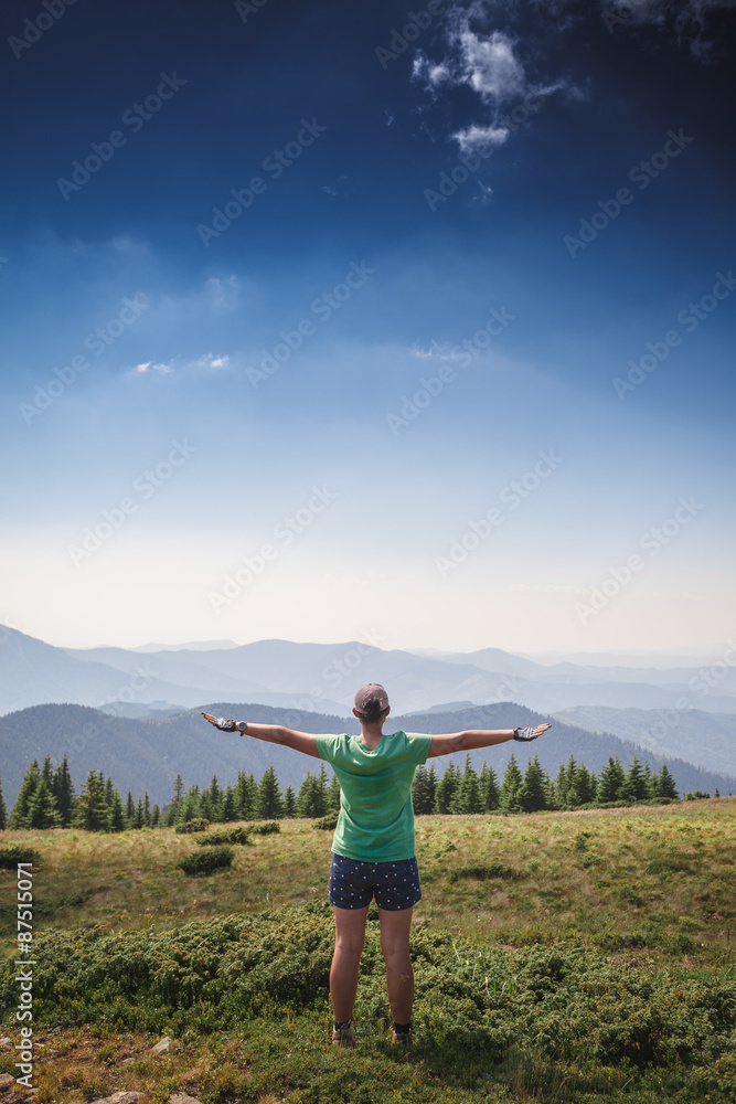 woman standing on top