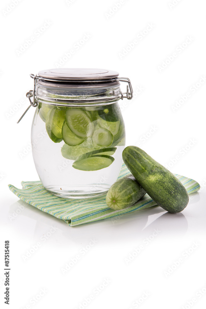 Infused fresh fruit water of cucumber. isolated over white Infused fresh fruit water of cucumber. isolated over white
