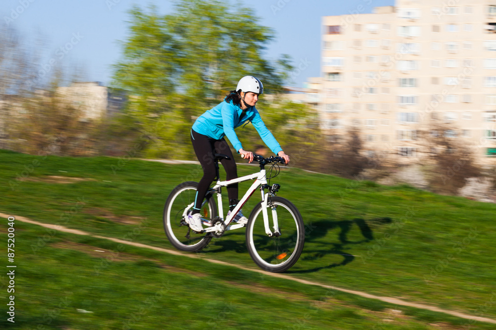 Female biker in motion Female biker in motion