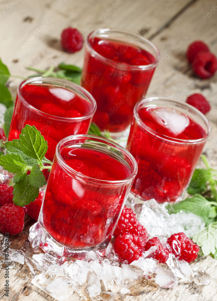 Cold Raspberry drink with mint and ice, selective focus Cold Raspberry drink with mint and ice, selective focus