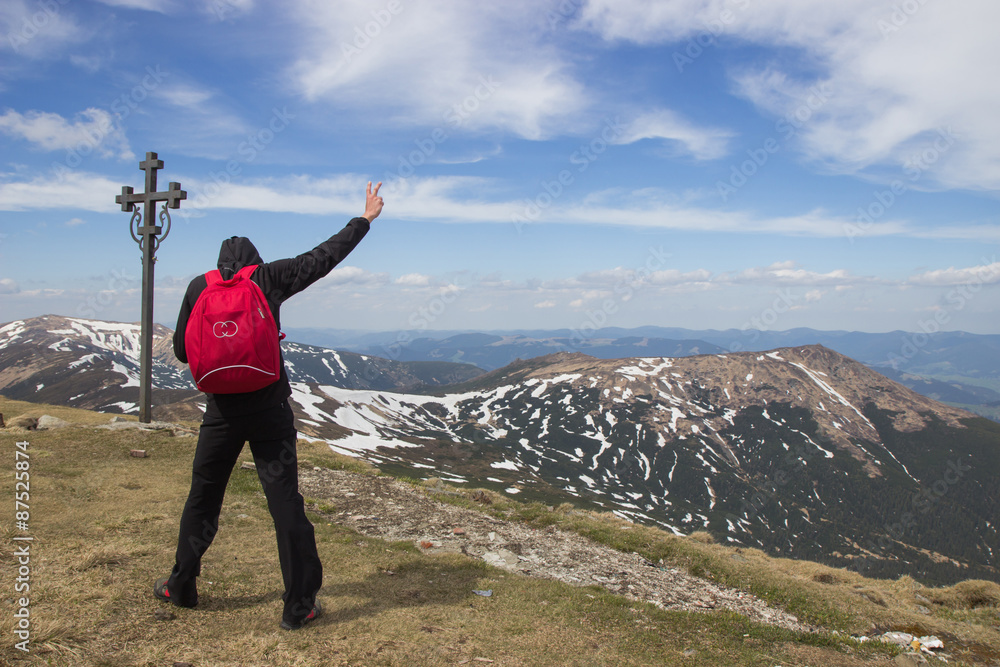 Man with a red backpack on the background Cross Carpathian Man with a red backpack on the background Cross Carpathian
