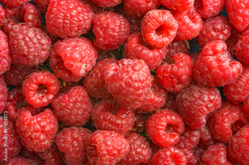 Sweet red raspberry as a background