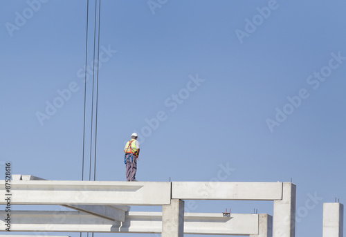 Height worker on building skeleton
