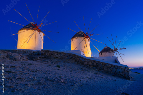 Famous Mykonos island windmills at twilight, Mykonos island, Cyclades, Greece