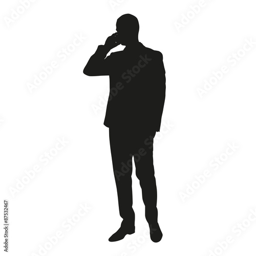 Business man silhouette with cell phone