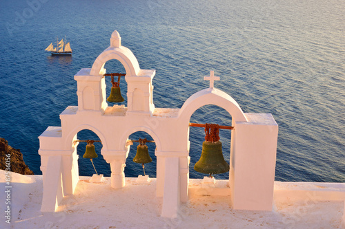 Abrahamic culture Church bells close on the seaside in Oia village in Santorini in Greece