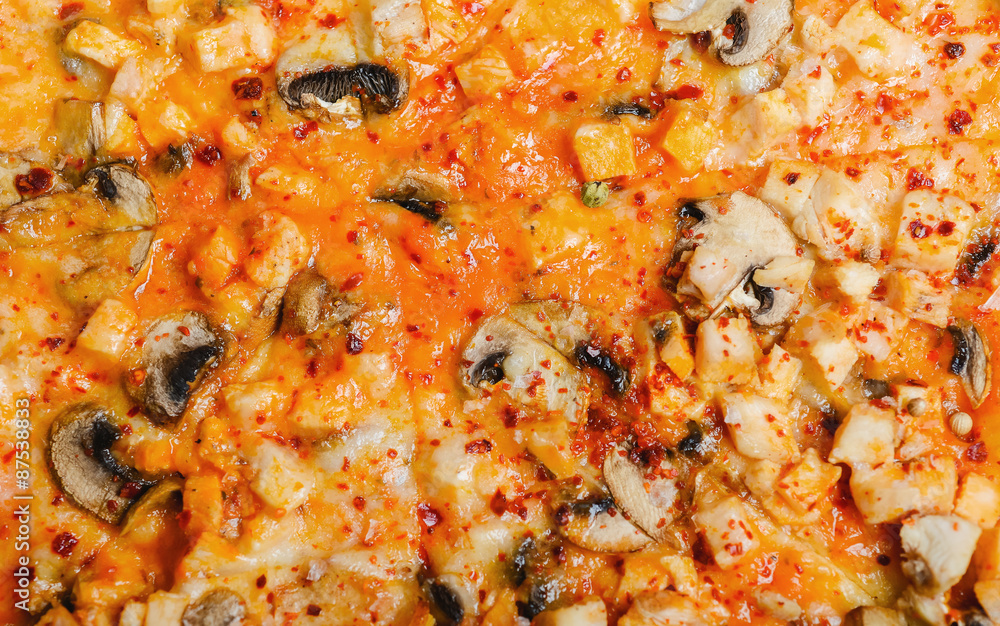 Delicious homemade pizza with cheese and mushrooms on a wooden Delicious homemade pizza with cheese and mushrooms on a wooden