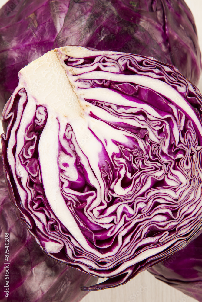 Obraz premium red cabbage on a wood