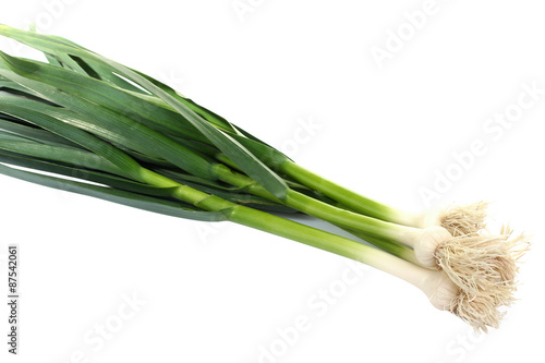 Bundle onions on a isolated white background 