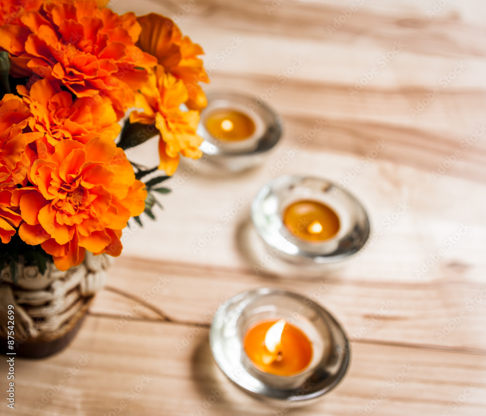 orange flowers on a wooden background orange flowers on a wooden background