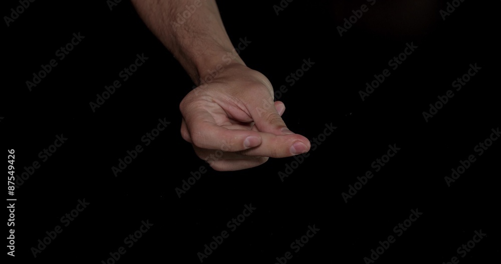 Closeup man hand for snap feeling on black background, isolated Closeup man hand for snap feeling on black background, isolated