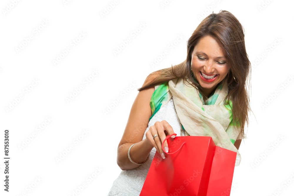 Fashionable Woman Looking Inside a Shopping Bag Fashionable Woman Looking Inside a Shopping Bag