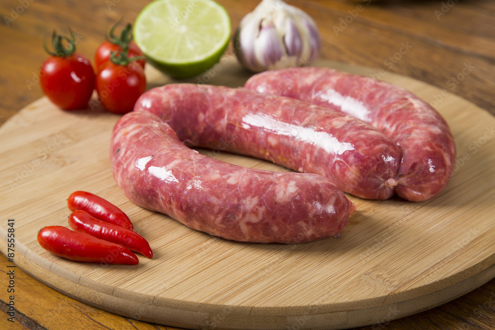 Sausage raw on the board Sausage raw on the board