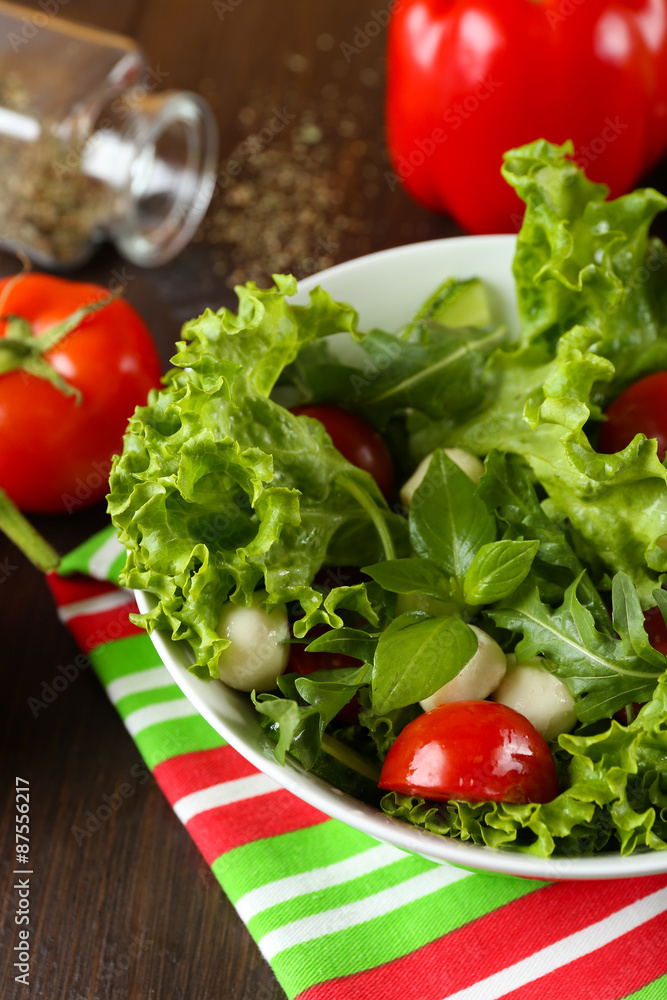 fresh vegetable salad in bowl on table close up fresh vegetable salad in bowl on table close up