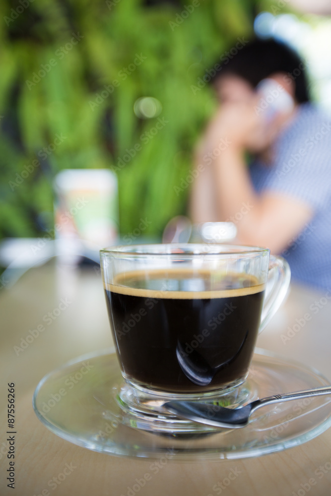 cup of coffee with man use cellphone background cup of coffee with man use cellphone background