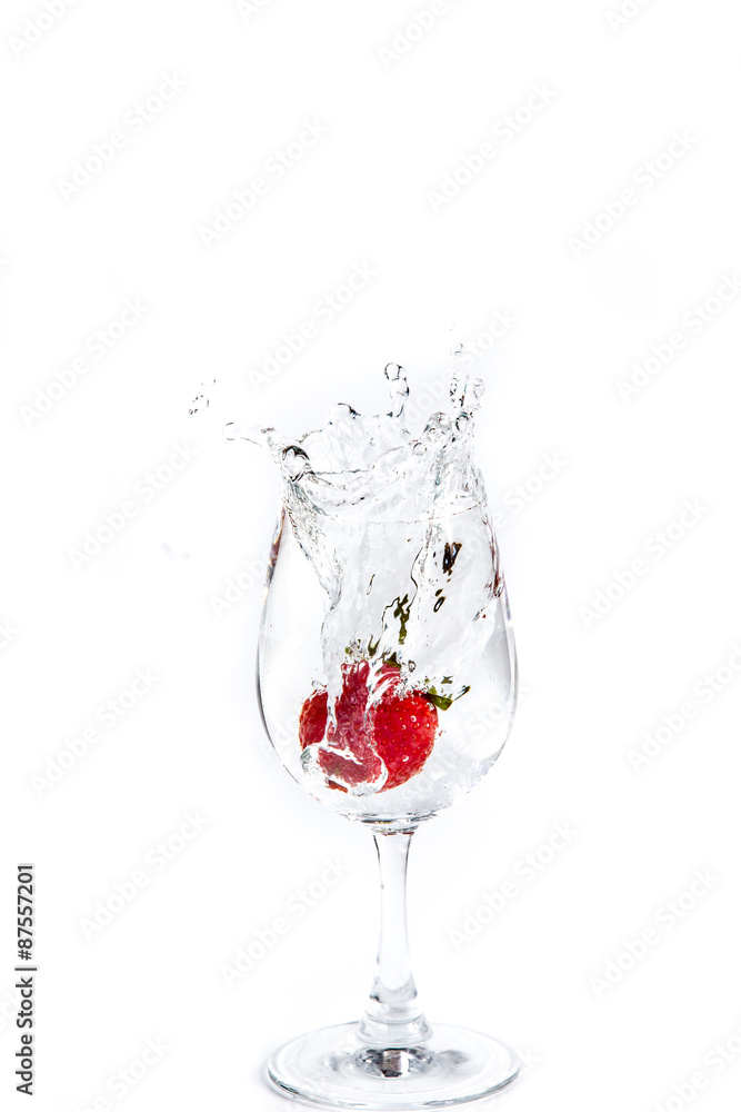 Strawberry in wine glass on a white background Strawberry in wine glass on a white background
