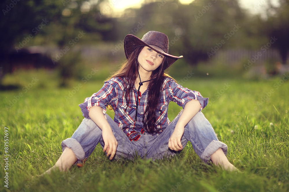 young girl in a cowboy hat young girl in a cowboy hat