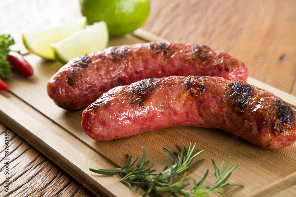 grilled meat sausages with potatoes and tomatoes grilled meat sausages with potatoes and tomatoes