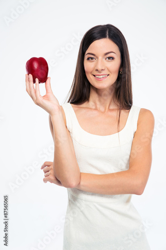 Happy slender woman holding apple