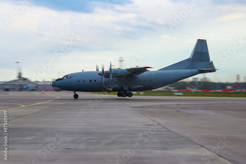 Military transport aircraft an 12 quatrains of the runway at the front desk