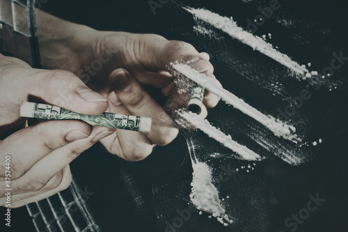 the man's hand and cocaine