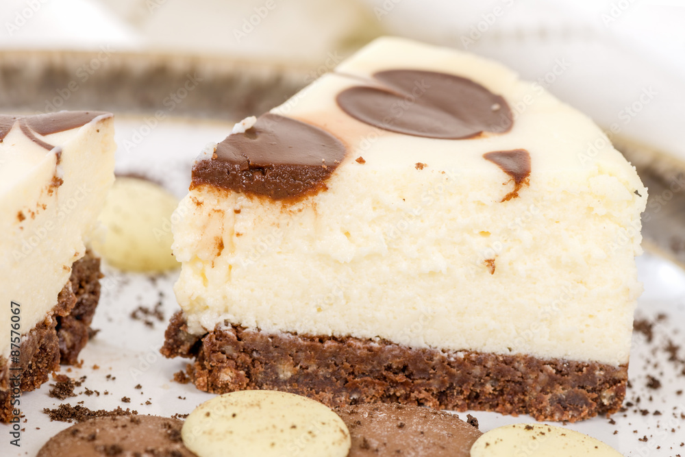 Cheesecake - Chocolate and vanilla cheesecake with chocolate buttons. Cheesecake - Chocolate and vanilla cheesecake with chocolate buttons.