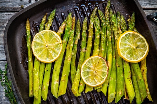 grilled organic asparagus with lemon photo