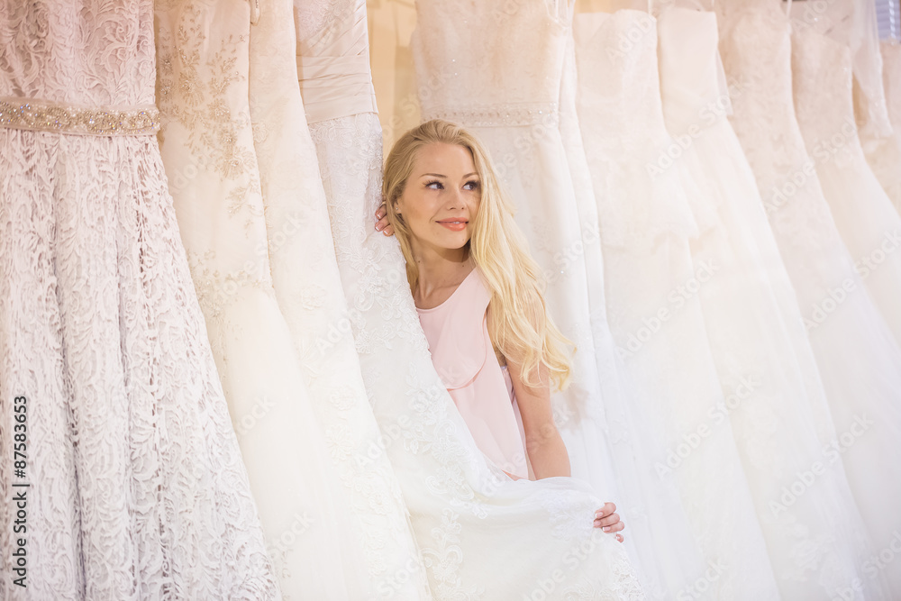 Young woman in dress shop Young woman in dress shop
