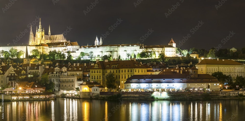 Illuminated Prague Castle in summer by night, Czech Republic, Europe