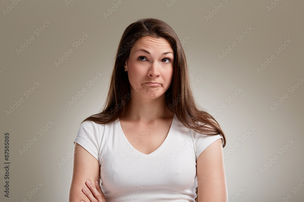 Portrait of uncertain woman with brunette hair Portrait of uncertain woman with brunette hair