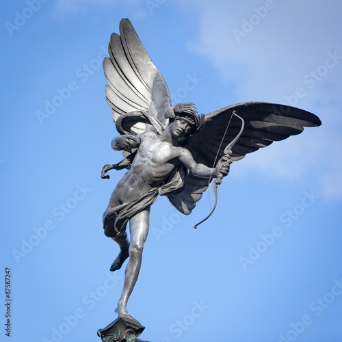 Statue of Eros, Piccadilly Circus, London. A low angle view of the familiar statue of Eros in Piccadilly Circus, London. photo